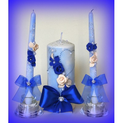 Свадебные свечи с синими атласными лентами  www.crystalmary.ru
